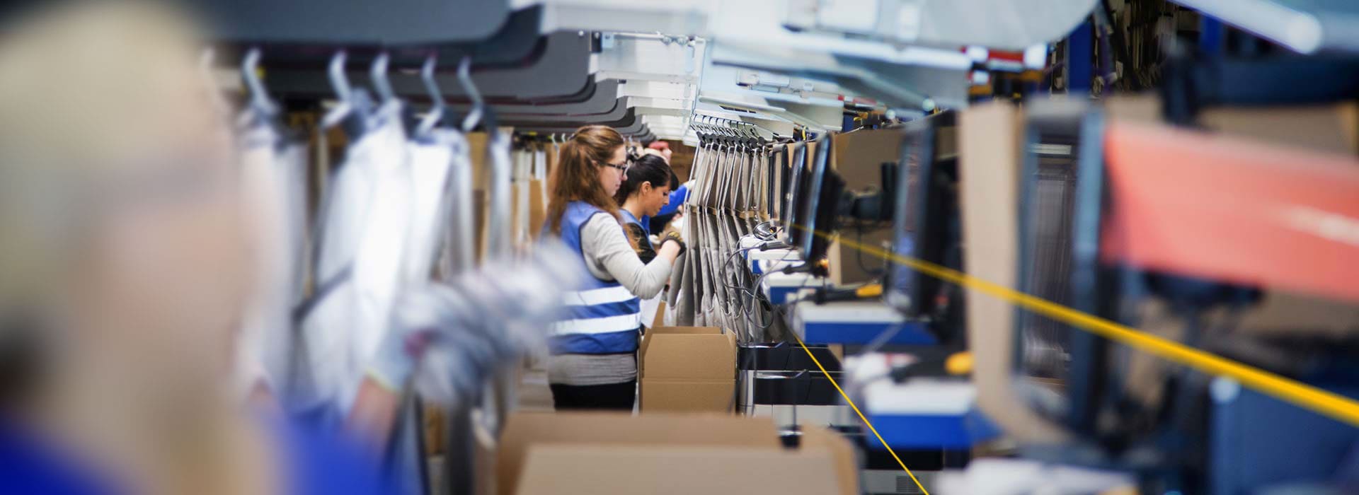LGI employees packing clothes